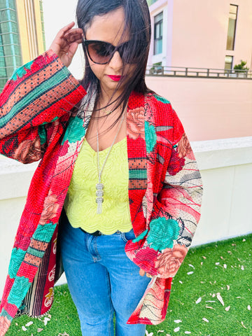 ndulge in the intricate beauty of this vintage Kantha Kimono Jacket, hand-stitched with love and care in India by artisans of Ornate Handicrafts