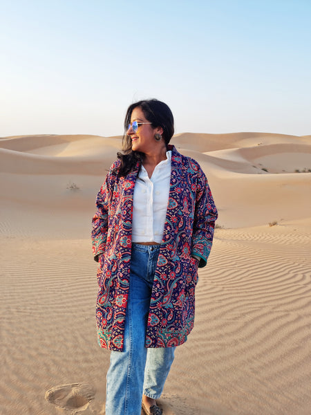 Navy Blue Paisley Quilted Silk Kimono made by artisans of Ornate Handicrafts in India using fair trade practice. Perfect outfit for casual shopping or date nights with friends at night.