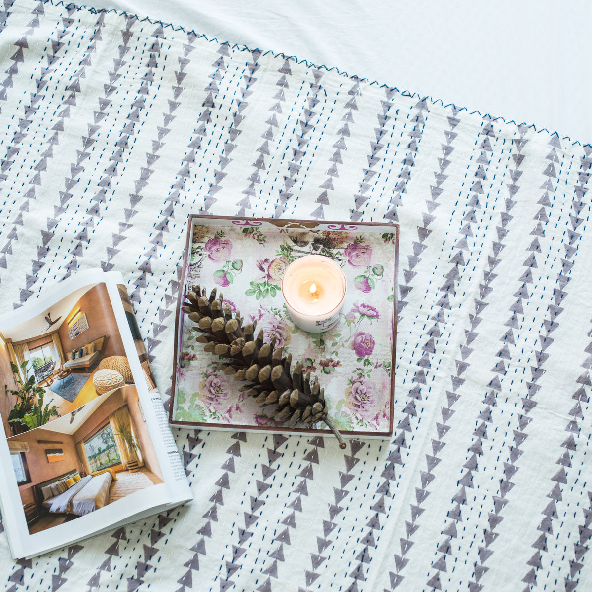 Texture detail of hand-stitched grey Kantha quilt