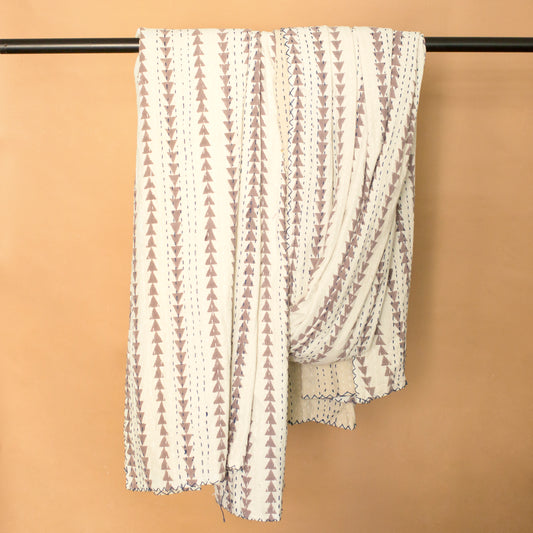 Grey arrow Kantha quilt folded showing stitching detail