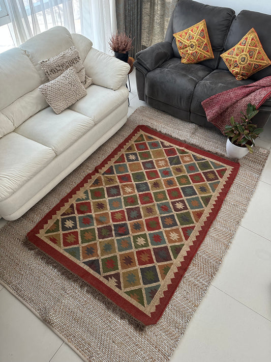 Red kilim rug handwoven in Rajasthan India