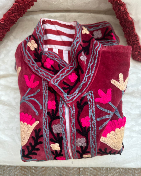 Red embroidered jacket with floral patterns on velvet fabric made by artisans in India for Ornate Handicrafts