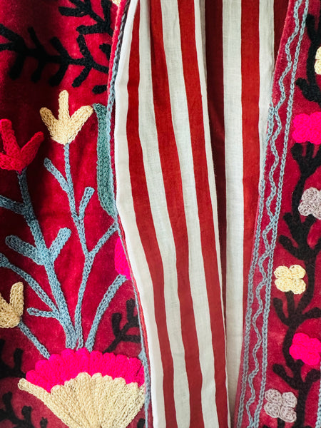 Red embroidered jacket with floral patterns on velvet fabric made by artisans in India for Ornate Handicrafts